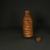 Bottle with lid (root weave)